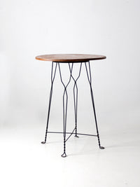 antique wrought iron and wood bistro table