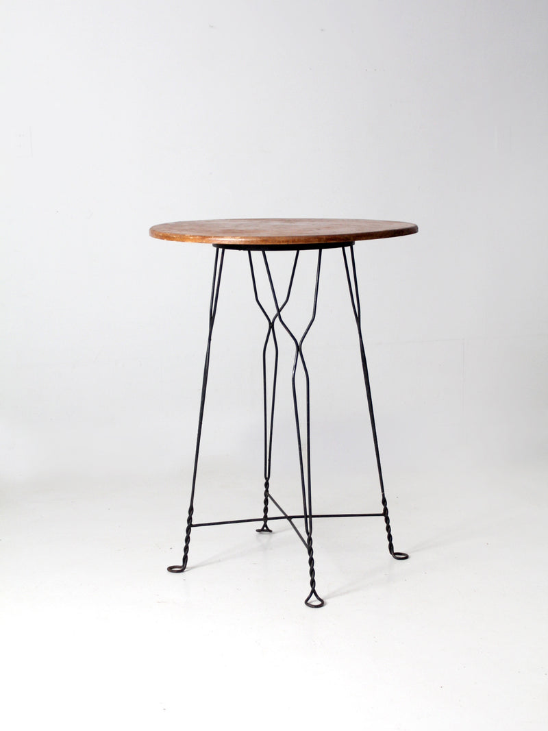 antique wrought iron and wood bistro table