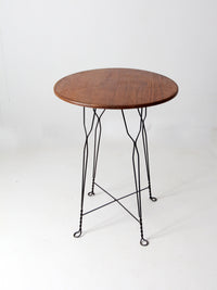 antique wrought iron and wood bistro table