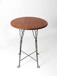 antique wrought iron and wood bistro table