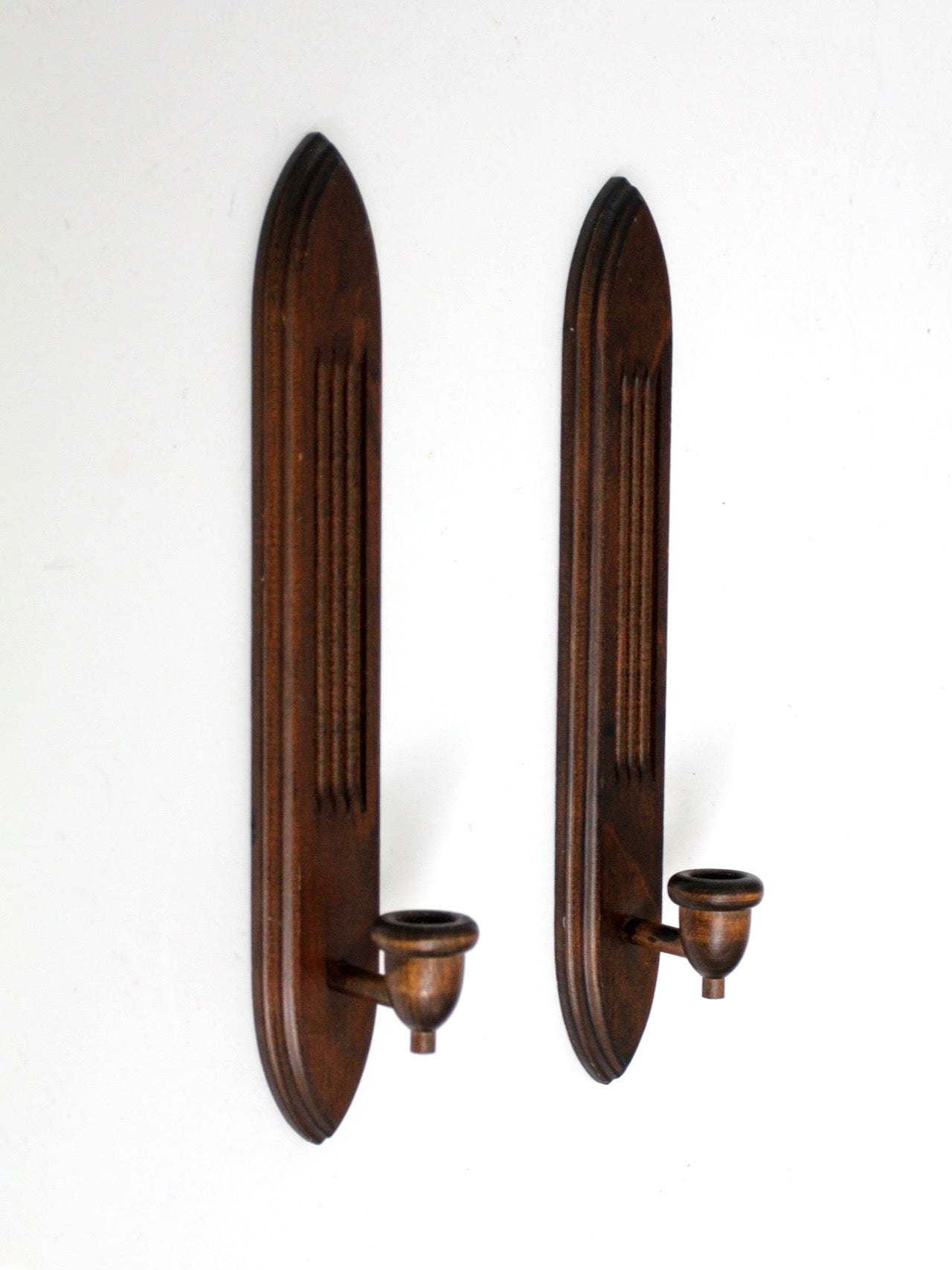 pair of mid-century gothic revival wood wall candle sconces