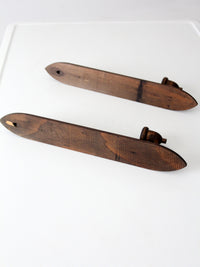 pair of mid-century gothic revival wood wall candle sconces