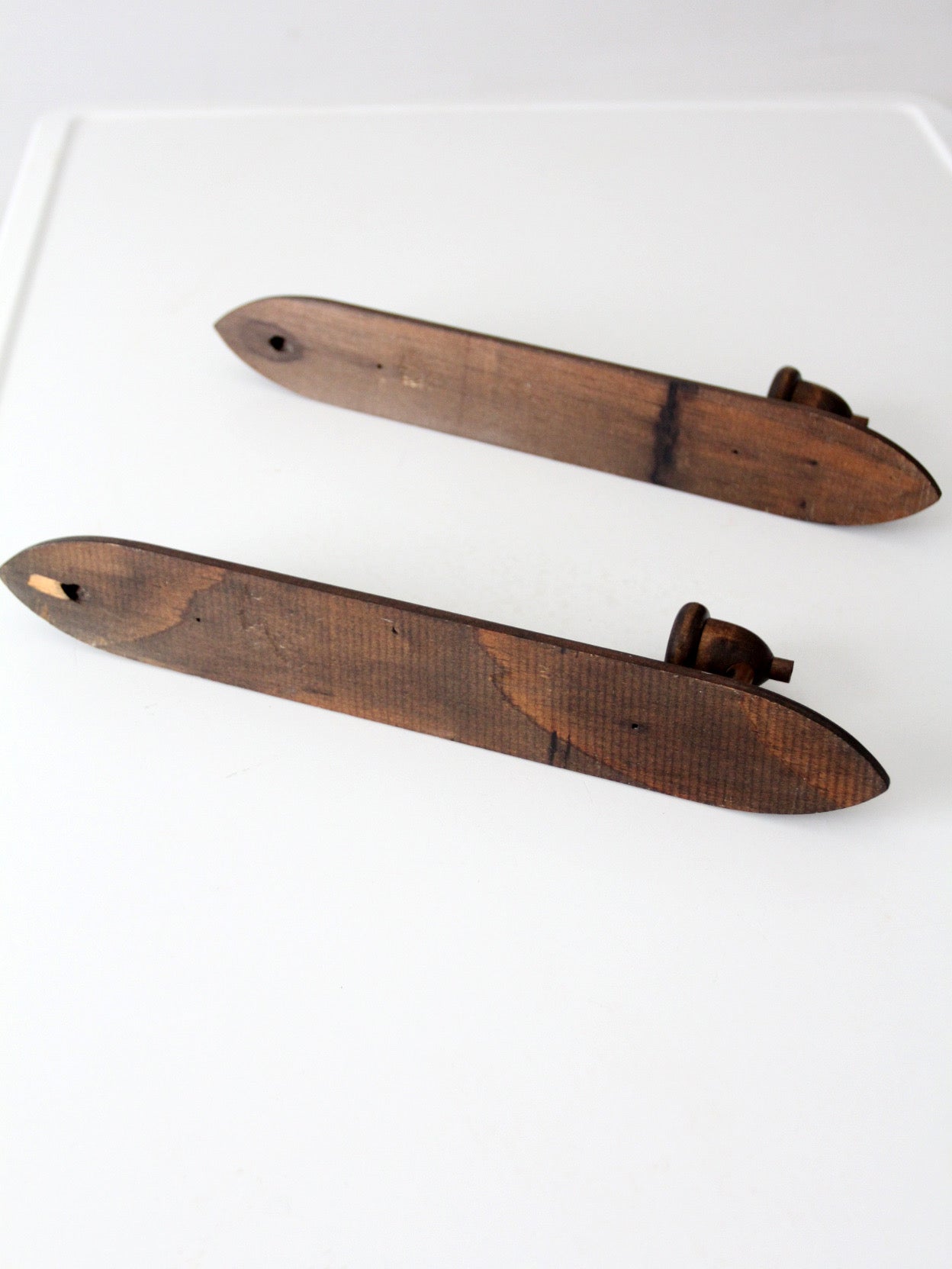 pair of mid-century gothic revival wood wall candle sconces