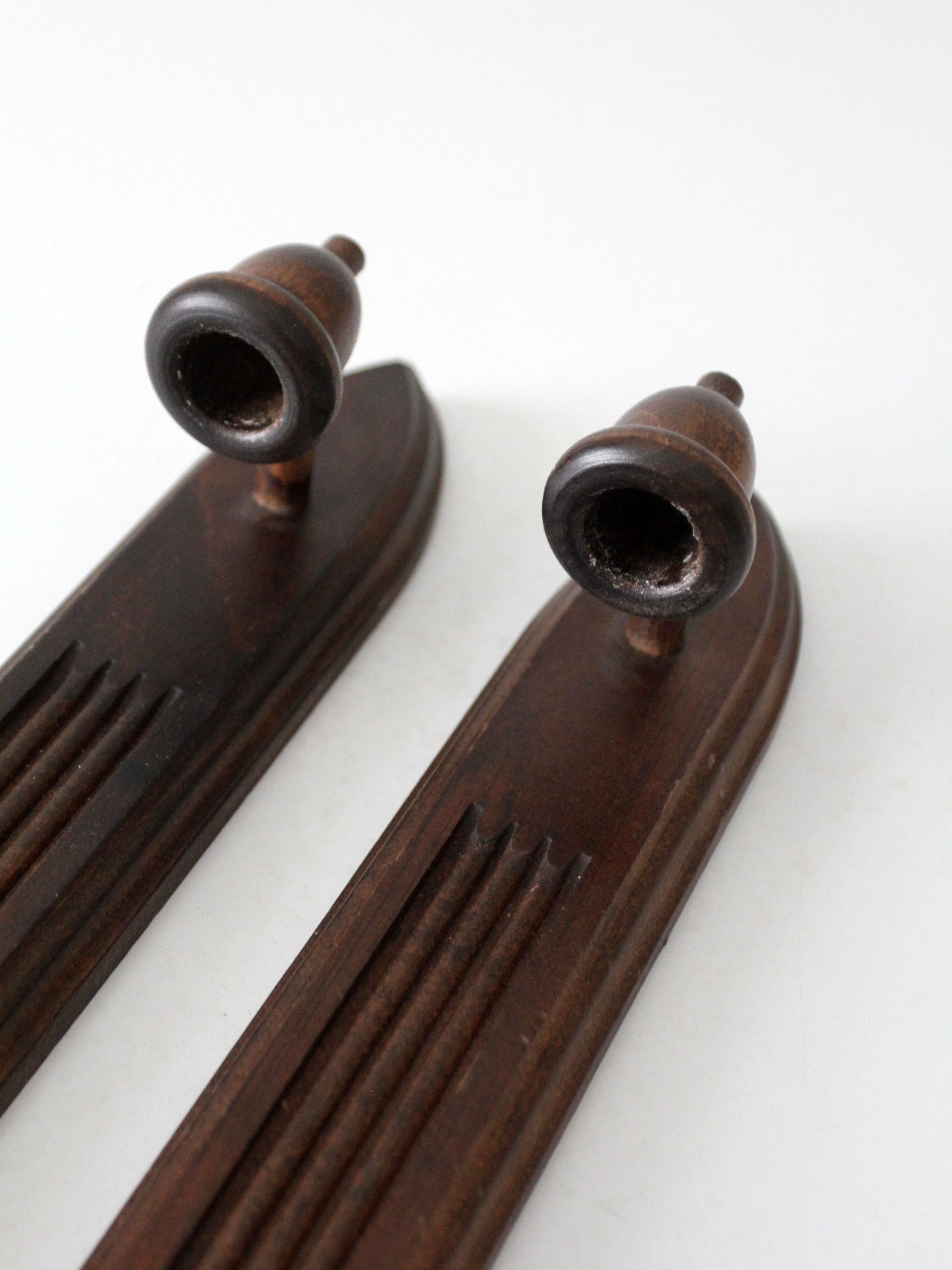 pair of mid-century gothic revival wood wall candle sconces