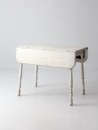 antique white painted drop leaf farmhouse table