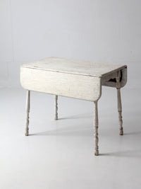 antique white painted drop leaf farmhouse table