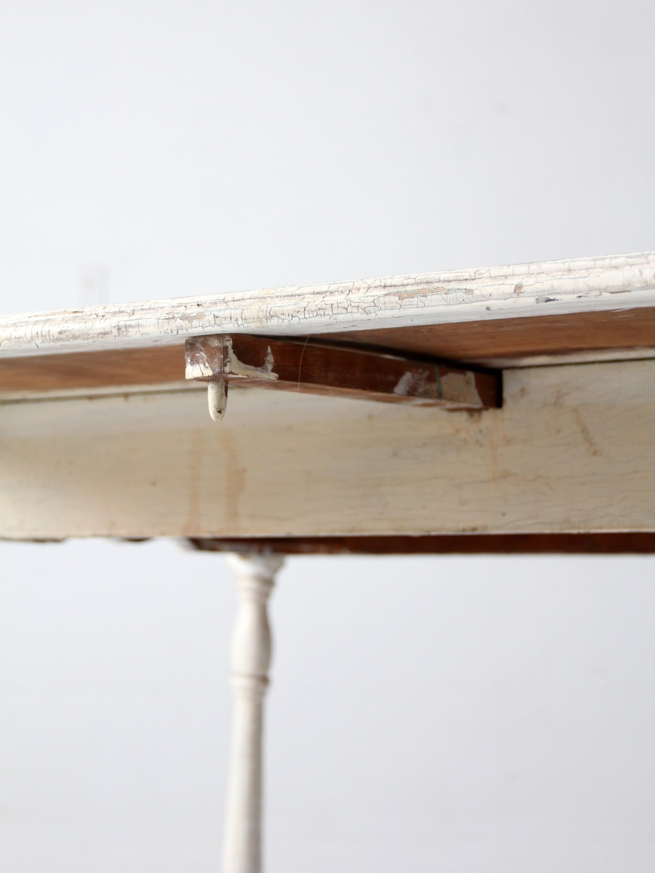 antique white painted drop leaf farmhouse table