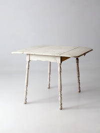 antique white painted drop leaf farmhouse table