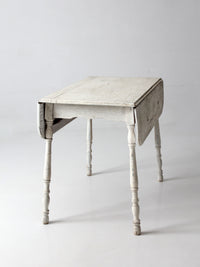 antique white painted drop leaf farmhouse table