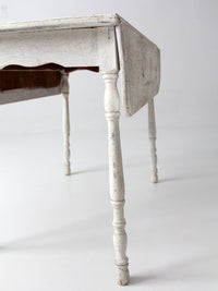 antique white painted drop leaf farmhouse table
