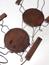 pair of antique A.H. Andrews & Co. wire bar stools