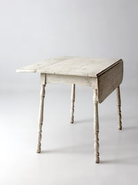 antique white painted drop leaf farmhouse table