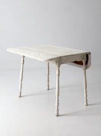 antique white painted drop leaf farmhouse table