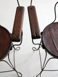 pair of antique A.H. Andrews & Co. wire bar stools