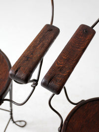 pair of antique A.H. Andrews & Co. wire bar stools