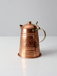 vintage hammered copper teapot with brass handle