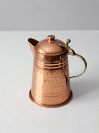 vintage hammered copper teapot with brass handle