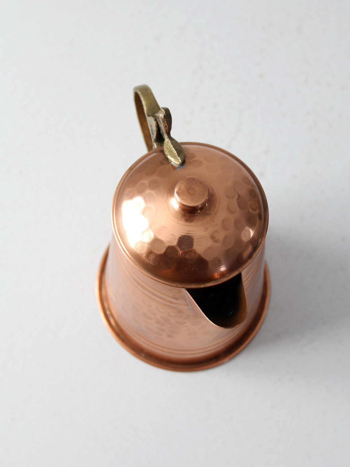 vintage hammered copper teapot with brass handle