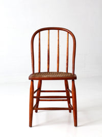 antique Windsor style cane seat chair
