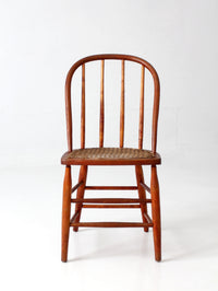 antique Windsor style cane seat chair