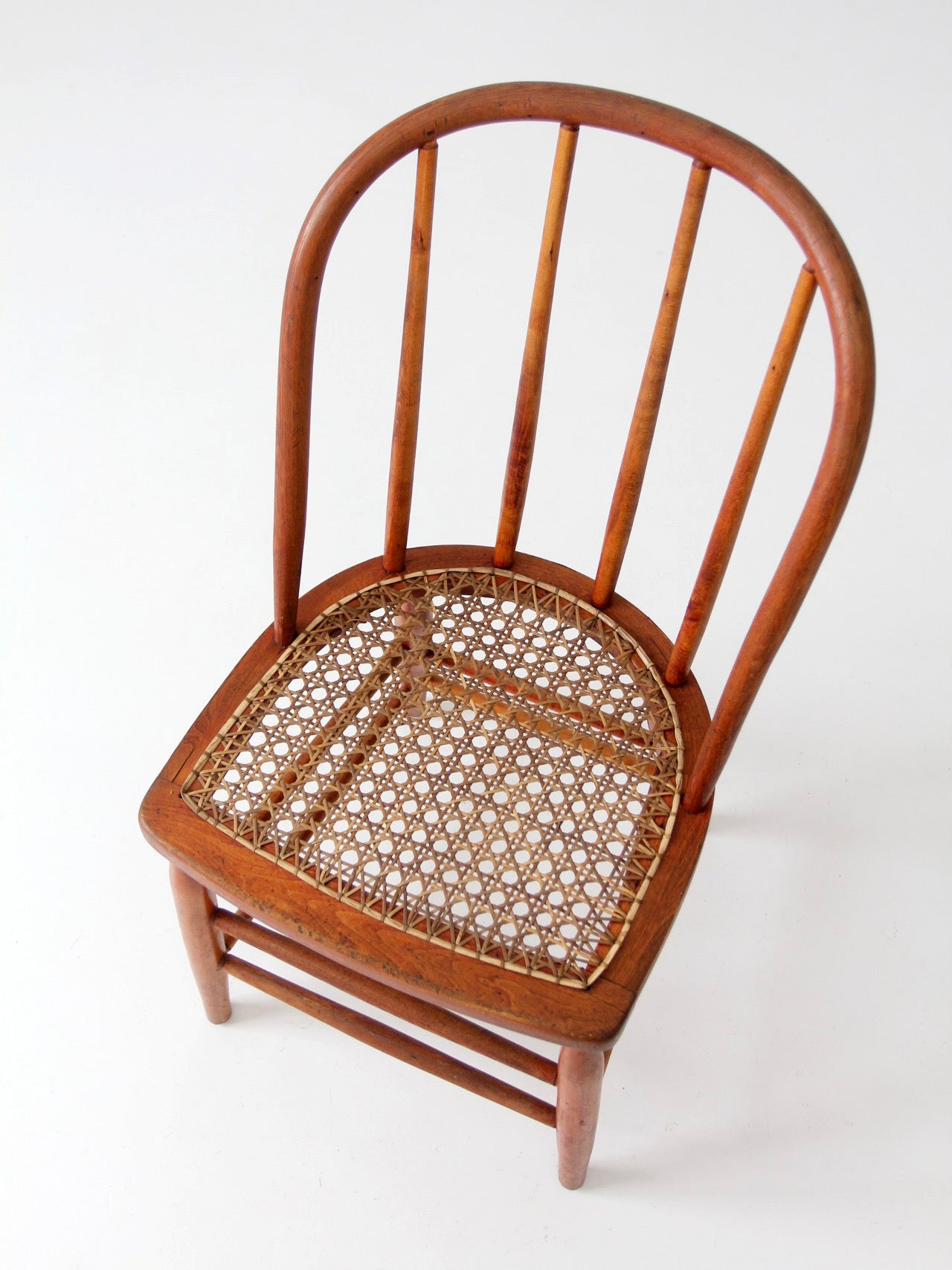 antique Windsor style cane seat chair