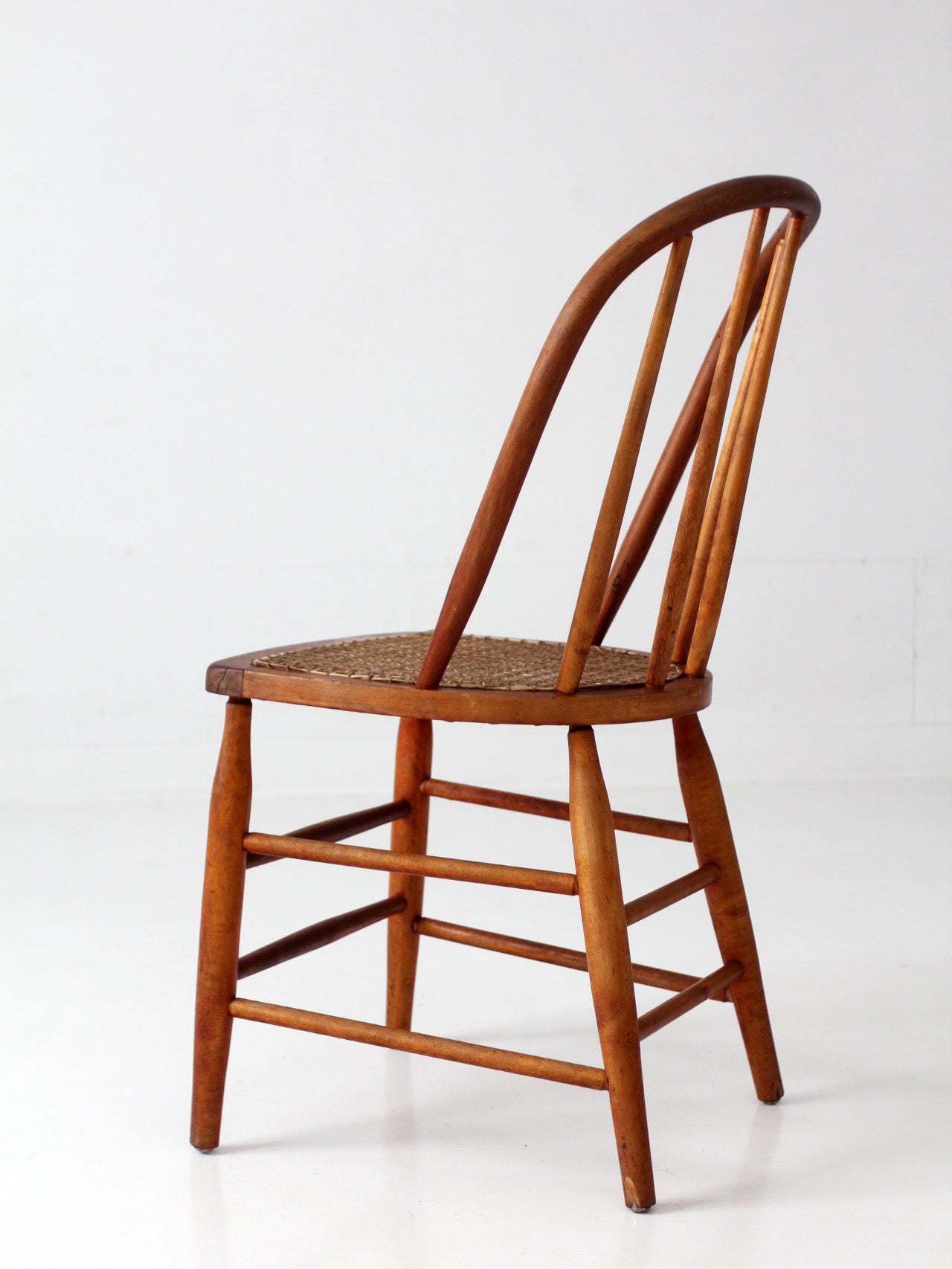antique Windsor style cane seat chair