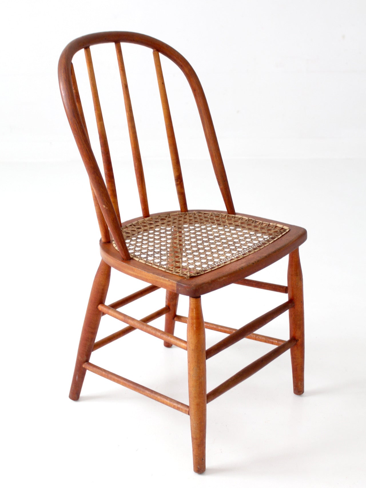 antique Windsor style cane seat chair
