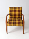 mid century lounge chair with plaid upholstery