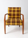mid century lounge chair with plaid upholstery