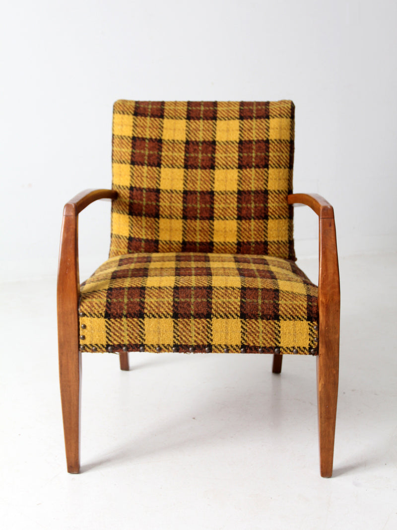 mid century lounge chair with plaid upholstery