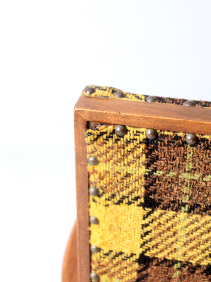mid century lounge chair with plaid upholstery