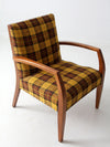 mid century lounge chair with plaid upholstery