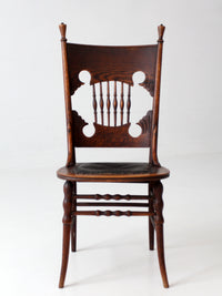 antique Eastlake Victorian oak side chair with leather seat