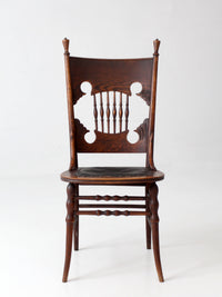 antique Eastlake Victorian oak side chair with leather seat