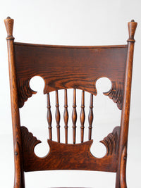 antique Eastlake Victorian oak side chair with leather seat