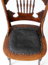 antique Eastlake Victorian oak side chair with leather seat