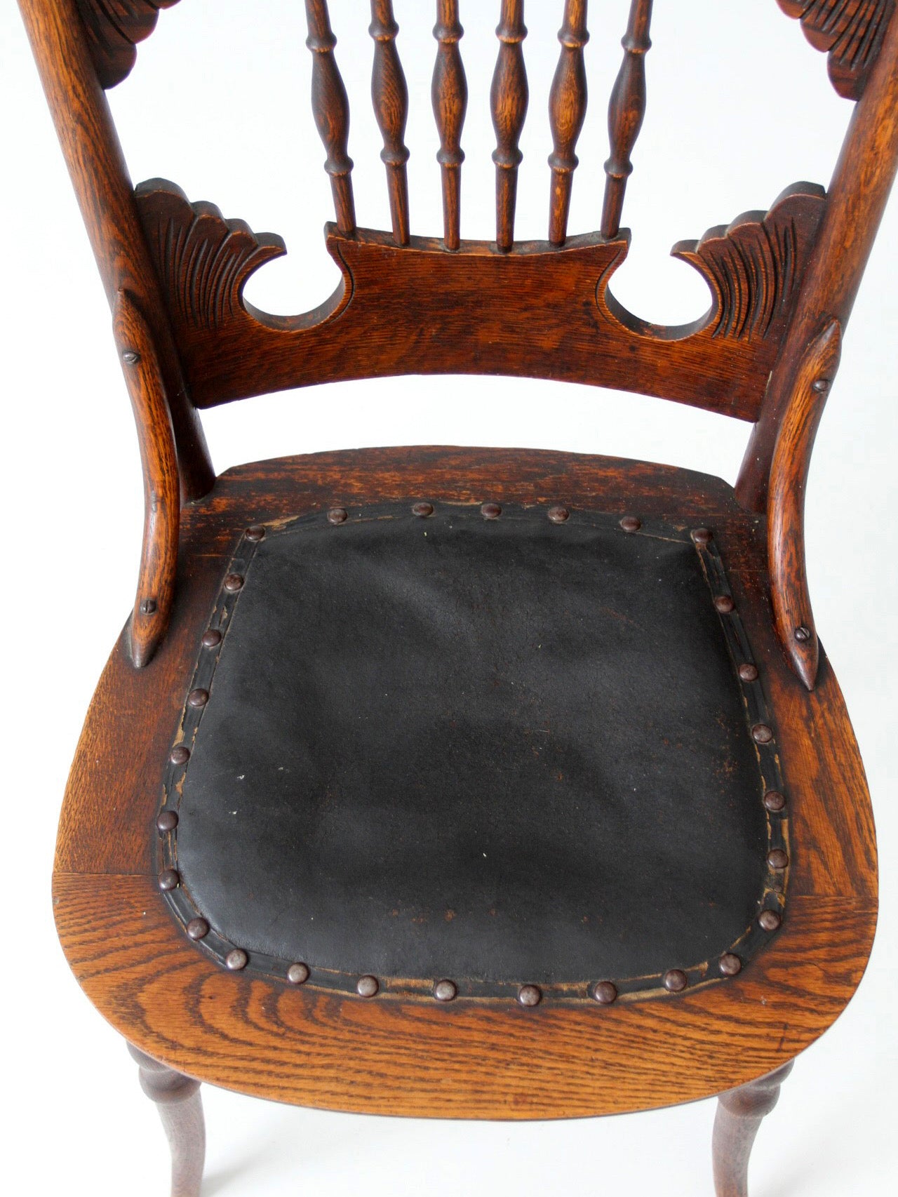 antique Eastlake Victorian oak side chair with leather seat