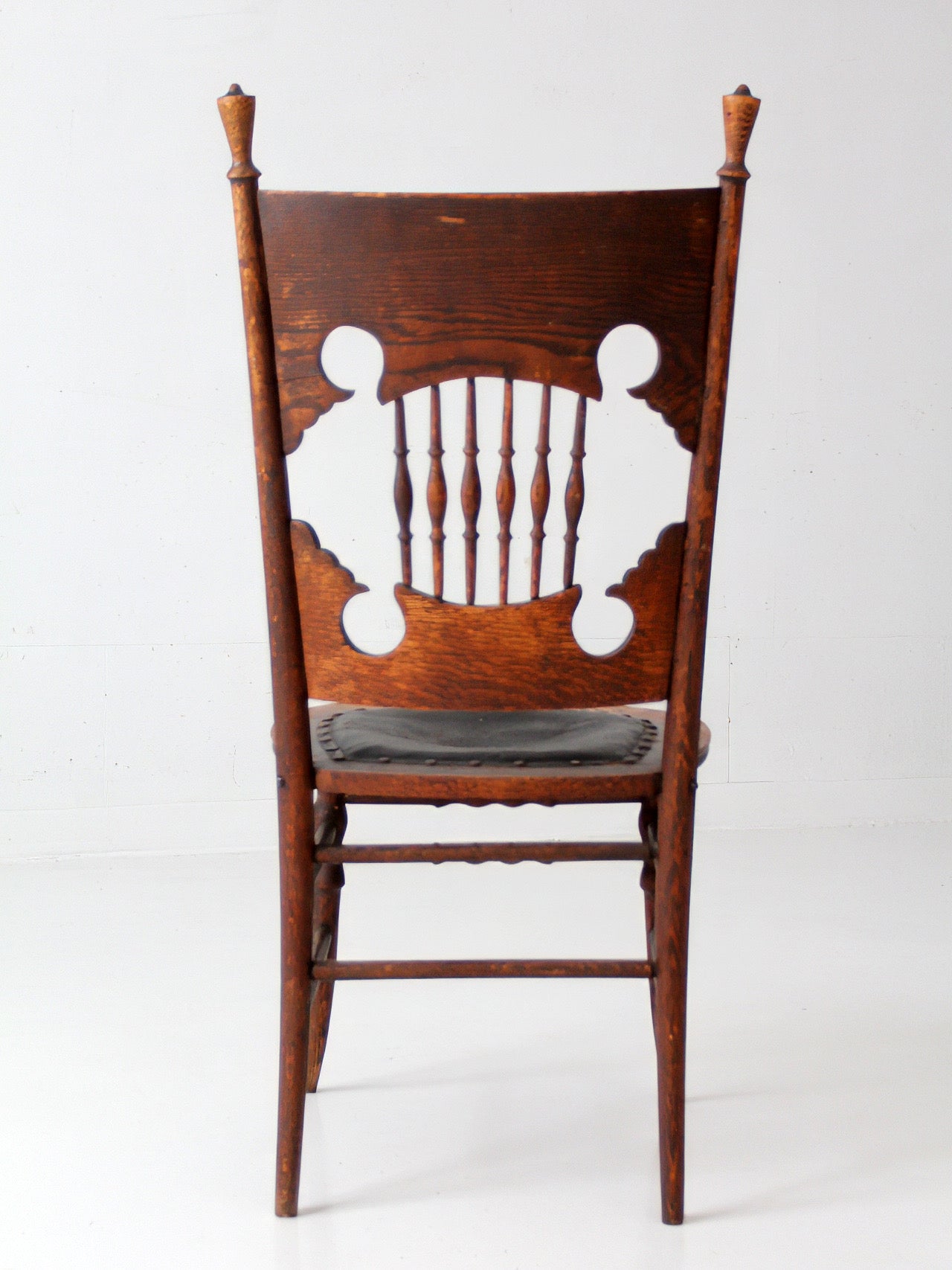 antique Eastlake Victorian oak side chair with leather seat
