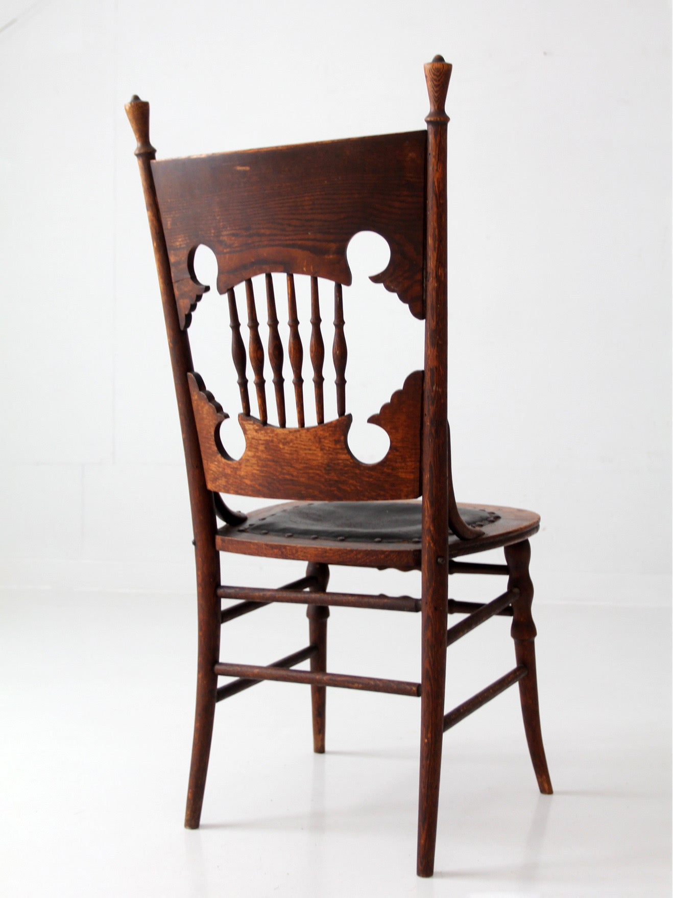 antique Eastlake Victorian oak side chair with leather seat