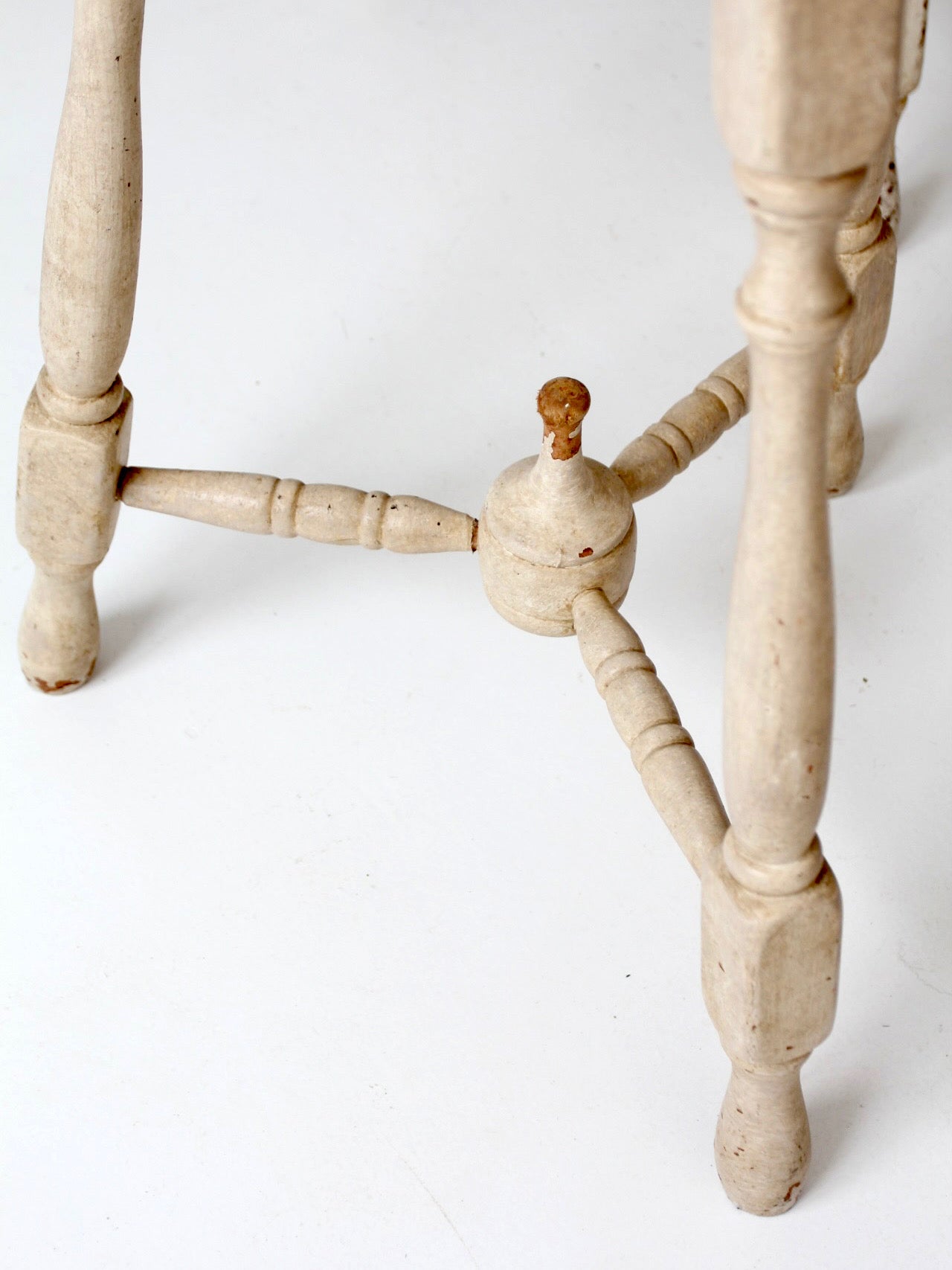 pair of vintage cottage pedestal tables