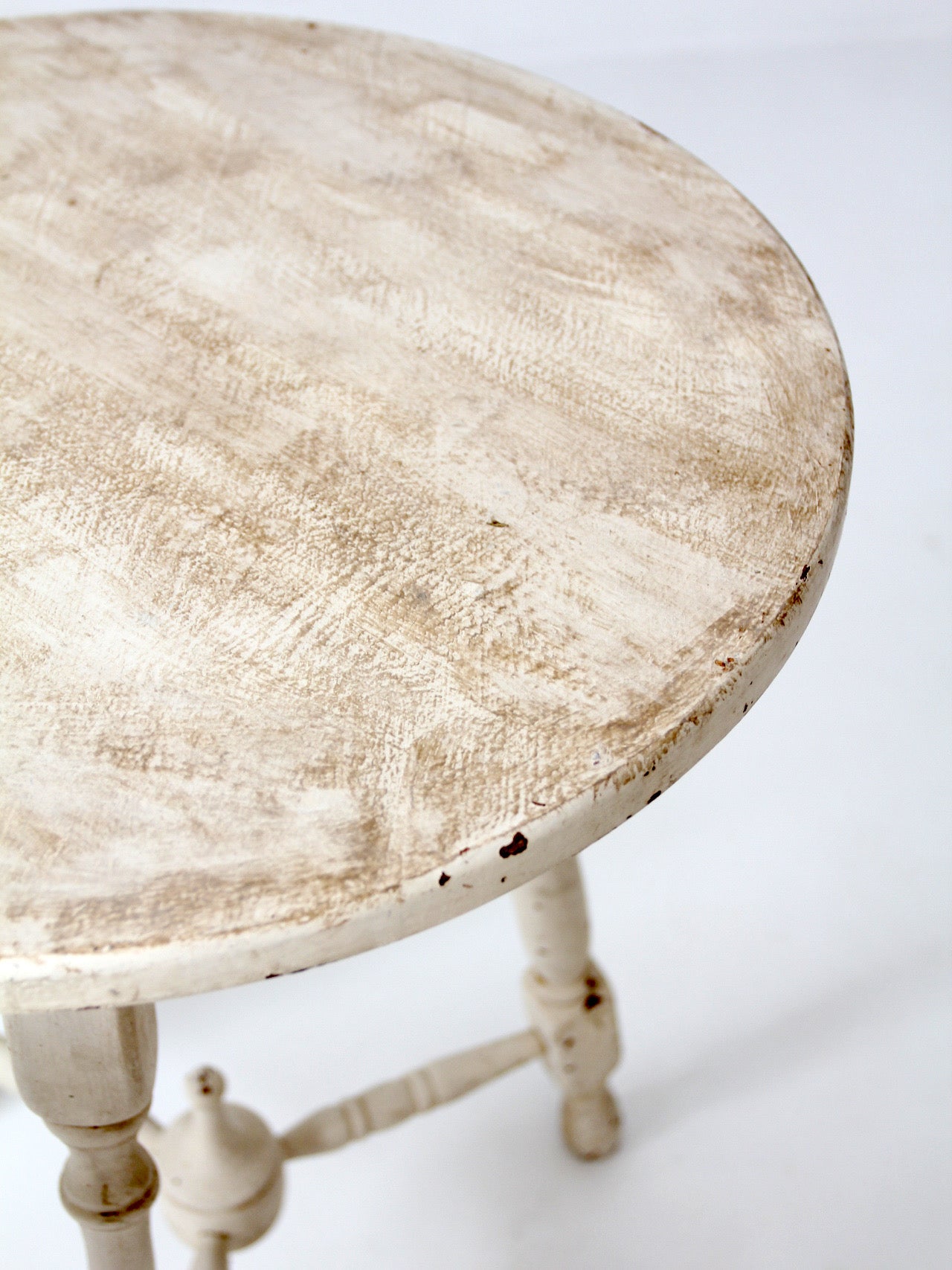 pair of vintage cottage pedestal tables