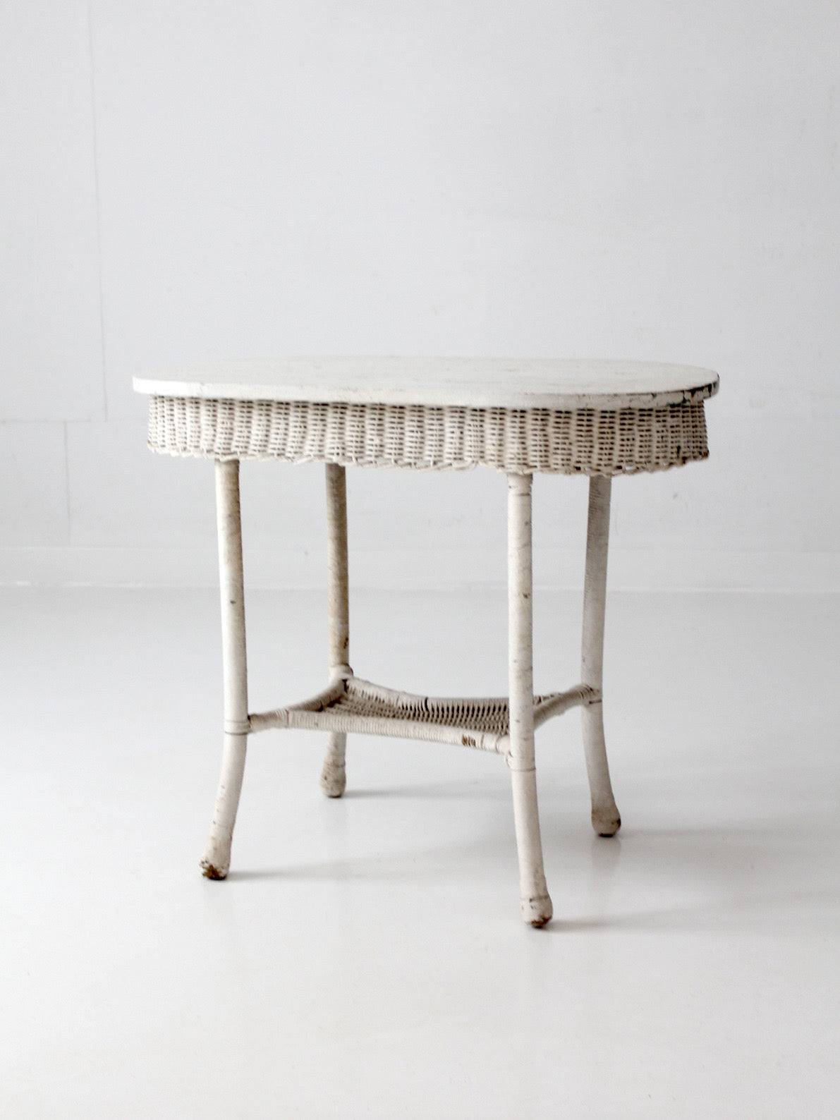 antique white wicker sunroom table