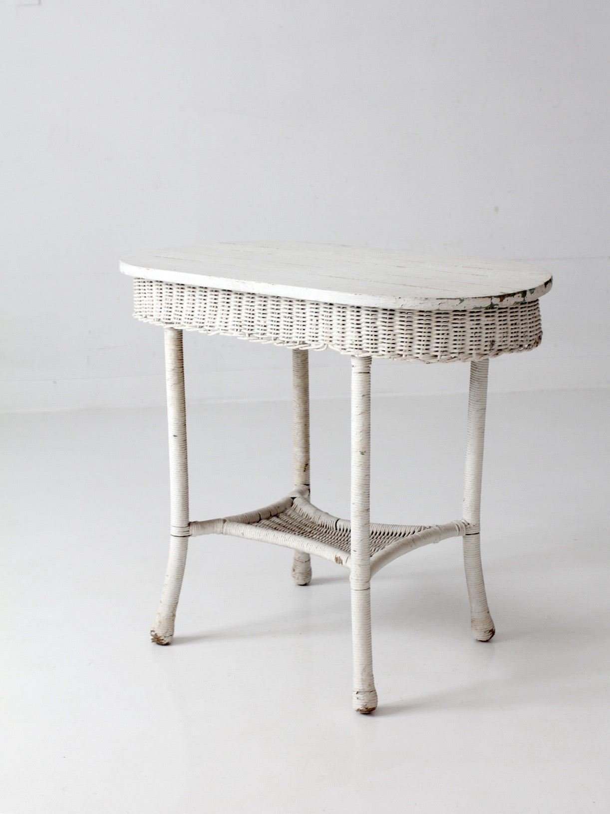 antique white wicker sunroom table