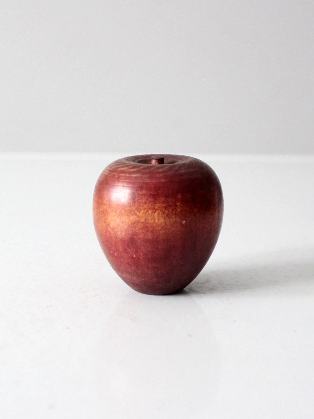 mid-century wooden apple paperweight