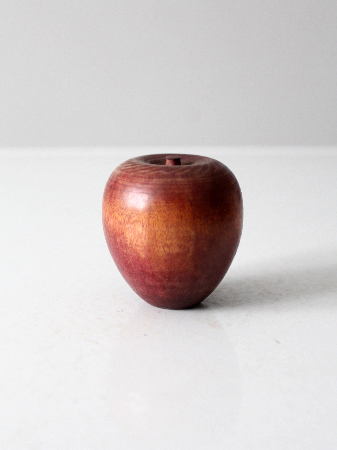 mid-century wooden apple paperweight