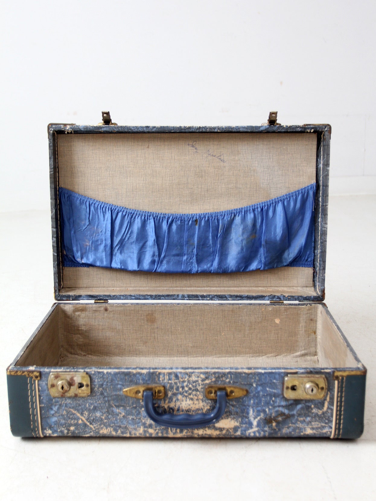 mid-century Vacationer blue suitcase