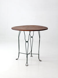 mid-century wrought iron bistro table