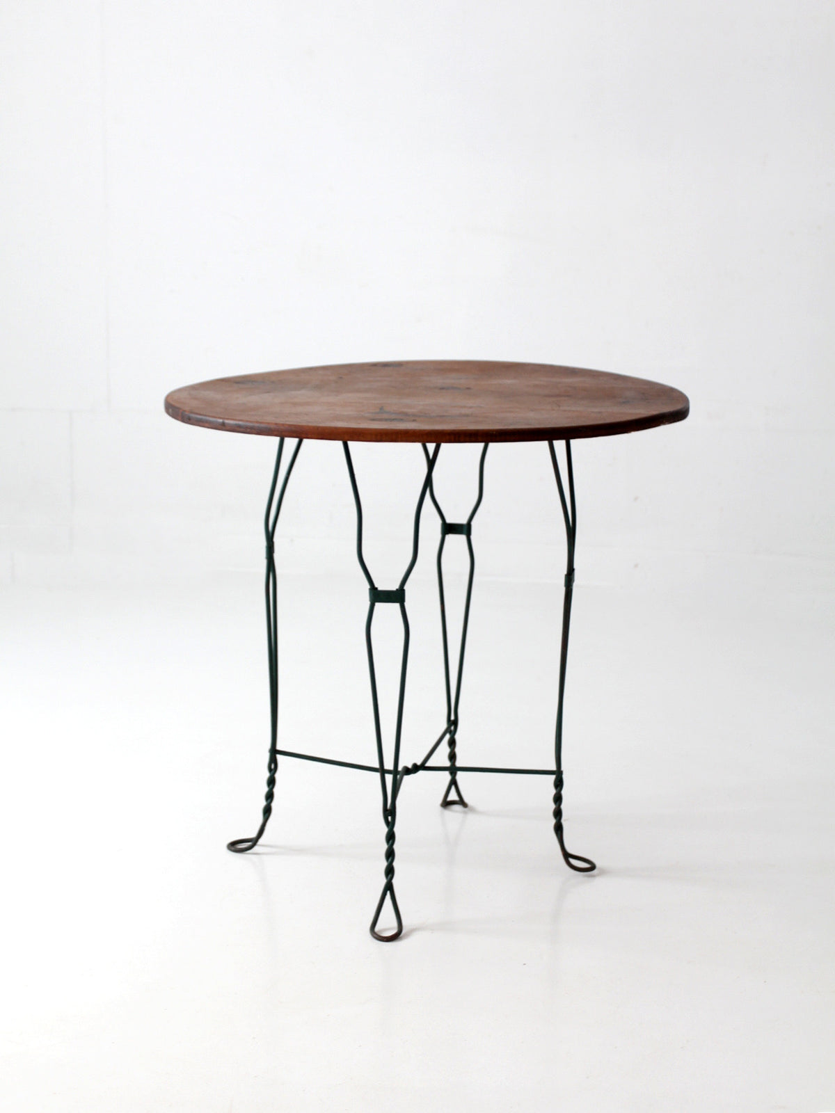 mid-century wrought iron bistro table