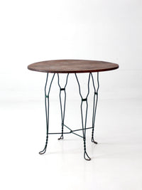 mid-century wrought iron bistro table