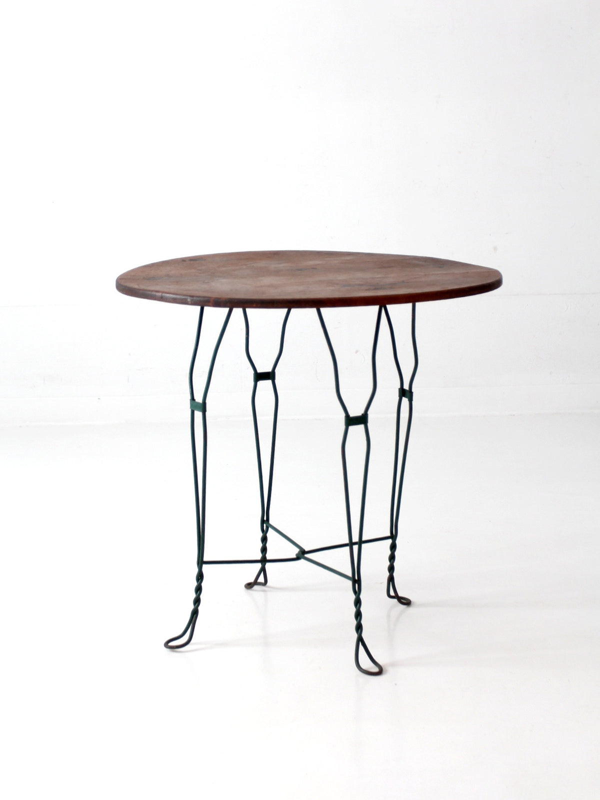 mid-century wrought iron bistro table